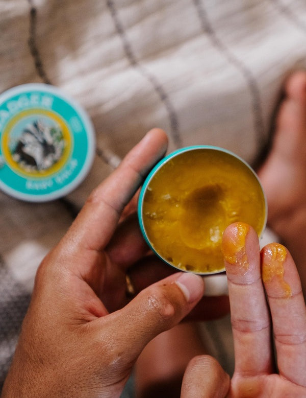 Badger Baby Balm applied during baby care