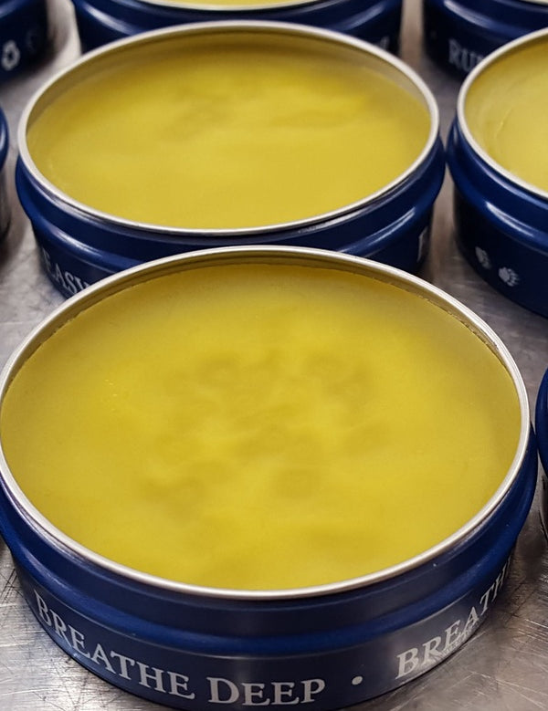 Open tins of Badger Aromatic Chest Rub