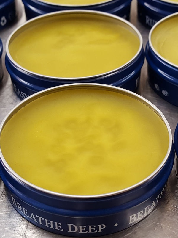 Open tins of Badger Aromatic Chest Rub
