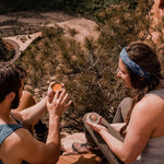 Hikers using Badger Sore Muscle Rub outdoors