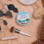 Badger Coconut After Sun Balm in a summer flat lay