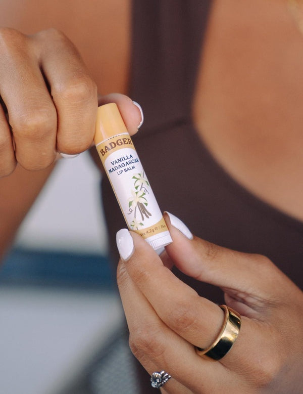 Badger Vanilla Madagascar Lip Balm being opened