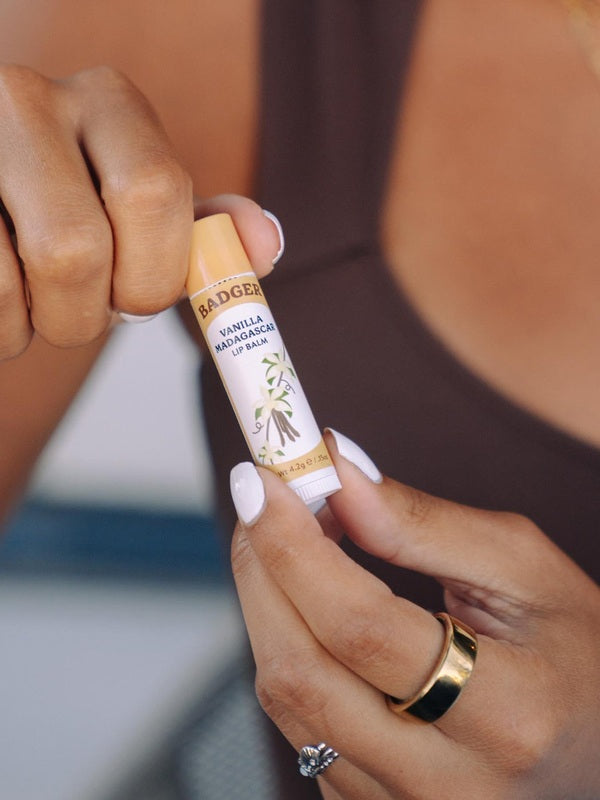 Badger Vanilla Madagascar Lip Balm being opened
