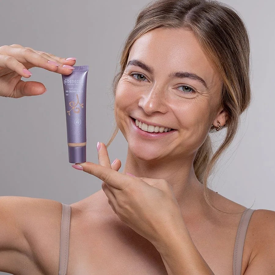 Model holding Benecos BB Cream