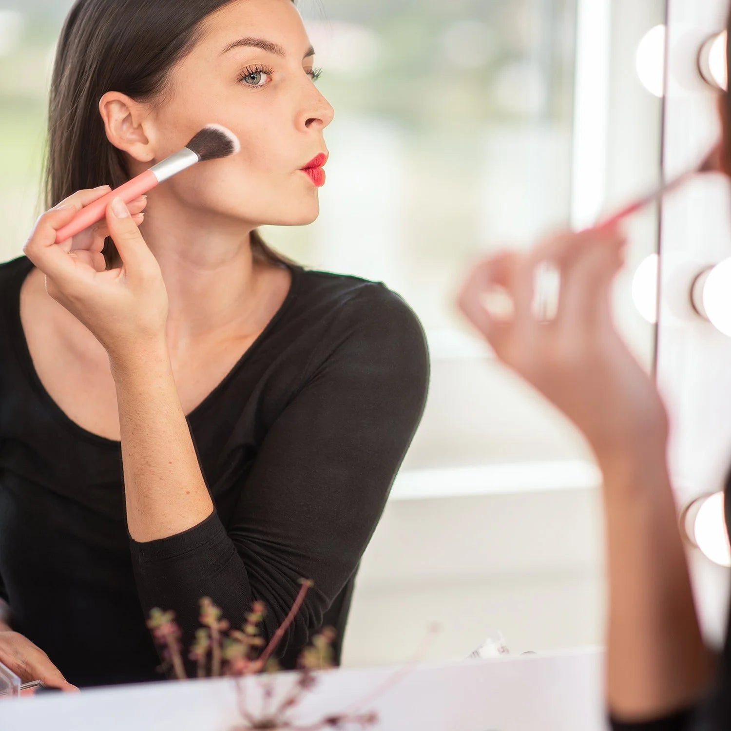 Benecos blush applied to a model