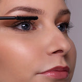 Model wearing Benecos Super Long Lashes Mascara