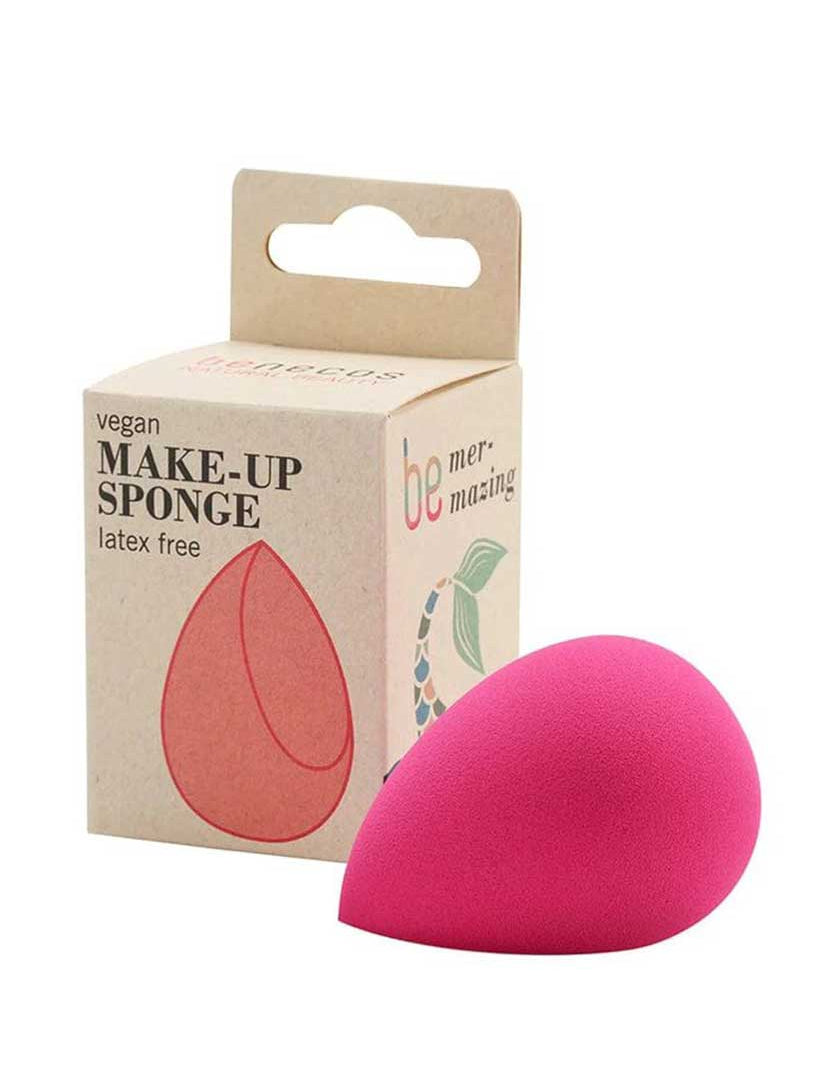 The Benecos Makeup Sponge, a pink teardrop-shaped, latex-free applicator, sits by its beige box labeled "vegan MAKE-UP SPONGE" with a simple illustration, ideal for flawless liquid foundation blending.