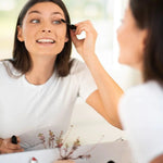 Model wearing Benecos Vegan Volume Mascara