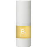Biologi Bk Vitamin C Face & Eye Serum 15ml in a compact white cylindrical bottle with a yellow Bk label and white cap, standing upright on white.