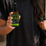 Black Chicken Remedies Axilla Rainforest Deodorant Spray — held in hand