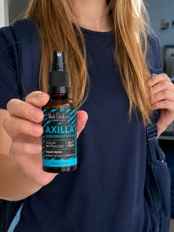 Black Chicken Remedies Axilla Wave Fresh Deodorant Spray — held in hand