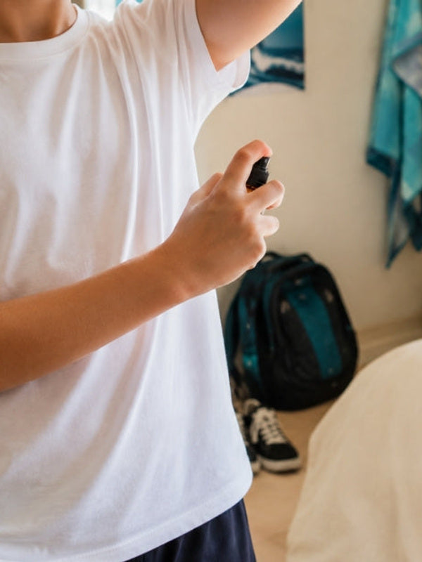 Black Chicken Remedies Axilla Wave Fresh Deodorant Spray — being applied