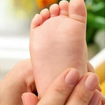 Gentle baby foot massage with Weleda Calendula Baby Oil