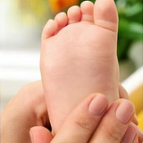 Gentle baby foot massage with Weleda Calendula Baby Oil