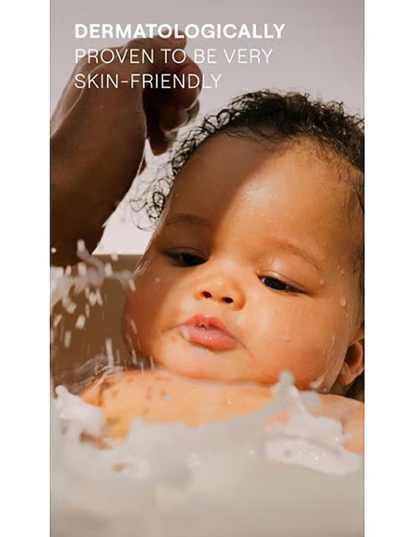Baby enjoying a gentle bath with Weleda Calendula Shampoo & Body Wash