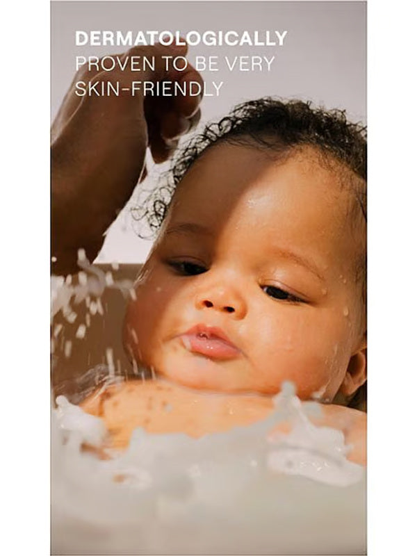 Baby enjoying a gentle bath with Weleda Calendula Shampoo & Body Wash