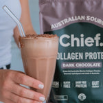 Hand holding a chocolate collagen drink beside CHIEF Collagen Protein