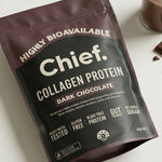 CHIEF Dark Chocolate Collagen Protein styled with chocolate and a drink