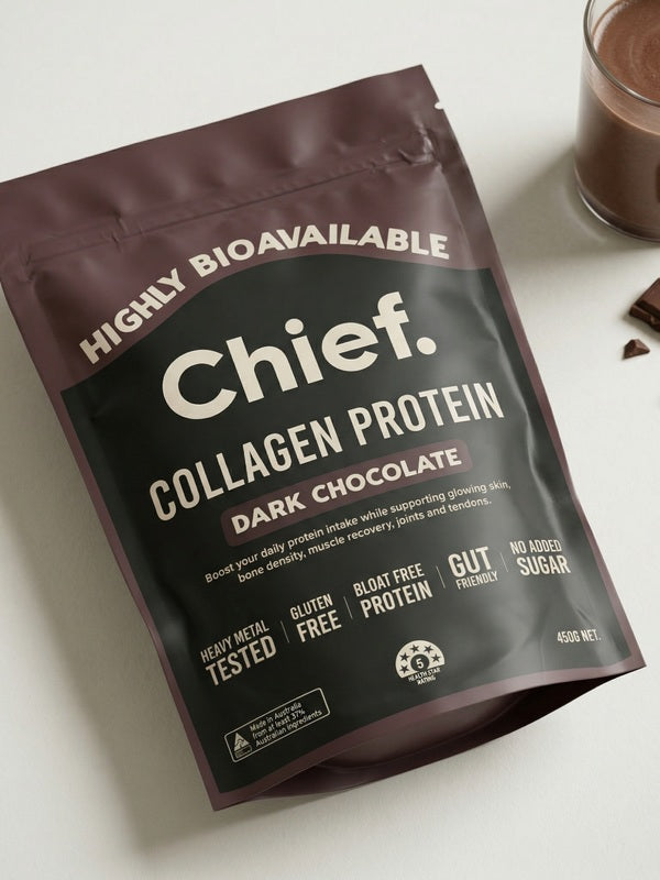 CHIEF Dark Chocolate Collagen Protein styled with chocolate and a drink