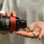 CHIEF Iron+C bottle pouring capsules into a hand