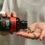 CHIEF Iron+C bottle pouring capsules into a hand
