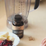 CHIEF Organic Beef Liver Capsules beside a breakfast blender