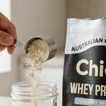 Chief Creamy Vanilla Whey Protein being added to a drink