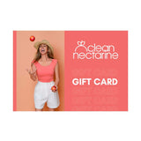 A woman wearing a straw hat holds a nectarine, embodying the fresh, natural beauty of the Clean Nectarine Gift Card.