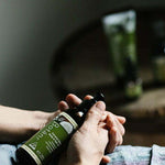 Botani Coconut Glow Body & Hair Oil 125ml — body and hair oil in hand