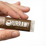 Hand holding Hurraw! Organic Lip Balm - Coffee 4.8g