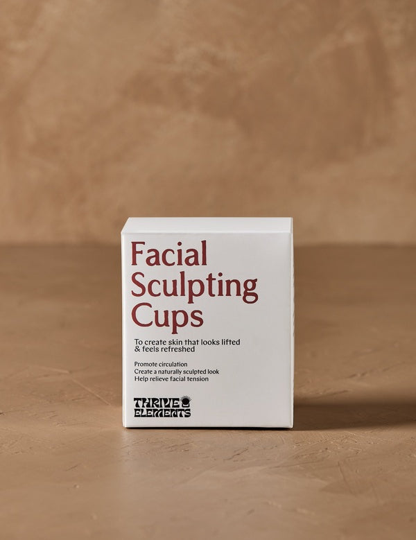 Facial Sculpting Cups packaging in warm natural light – Thrive Tallow Facial Sculpting Cups 2pcs