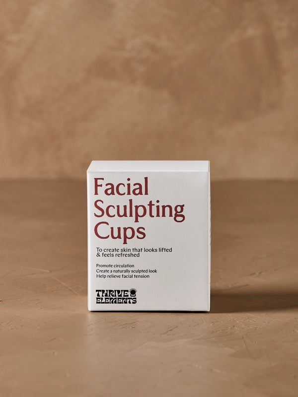 Facial Sculpting Cups packaging in warm natural light – Thrive Tallow Facial Sculpting Cups 2pcs