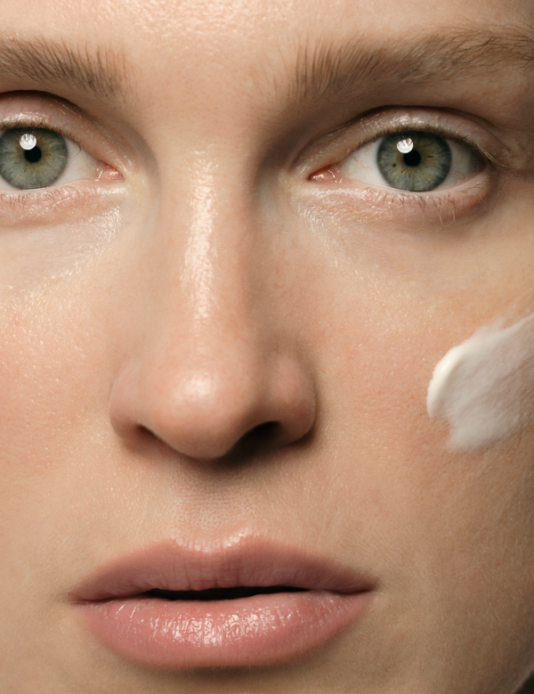 Model applying Madara Deep Moisture Night Cream