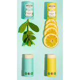 Deodorant Stick Citrus-Bergamot and Eucalyptus-Peppermint opened with peppermint leaves and slices of lemon.