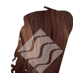 Close-up of dark warm brown hair for Desert Shadow Deep Chestnut Shadow, cropped into a brushstroke shape with the brand's pale geometric logo overlaid.
