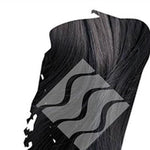 Close-up of blue-black hair with silvery highlights for Desert Shadow Indigo Shadow, cropped into a brushstroke shape with the brand's pale geometric logo overlaid.