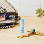 Dr. Bronner's Naked Organic Lip Balm in a lifestyle setting