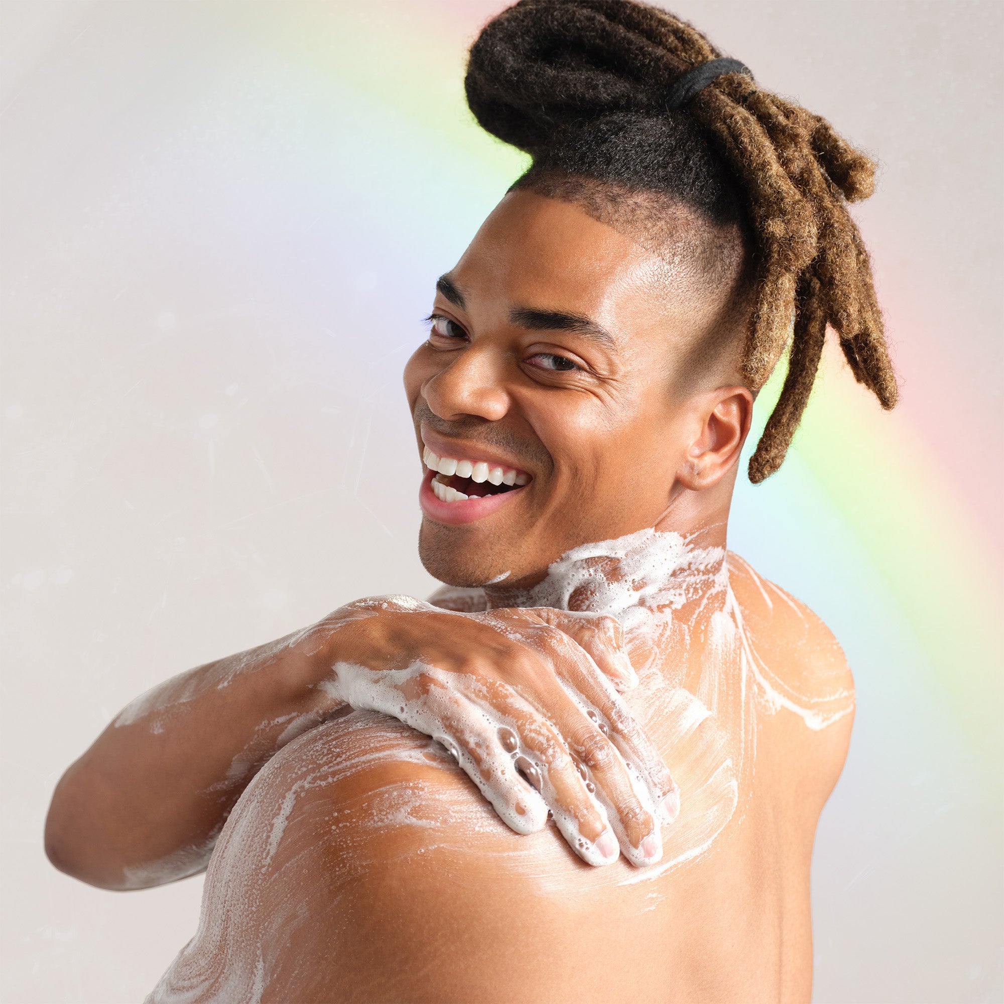 Person washing with Dr. Bronner's Almond Pure-Castile Liquid Soap