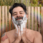 Person washing with Dr. Bronner's Eucalyptus Pure-Castile Liquid Soap