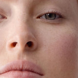Close-up model wearing Dr Hauschka Concealer