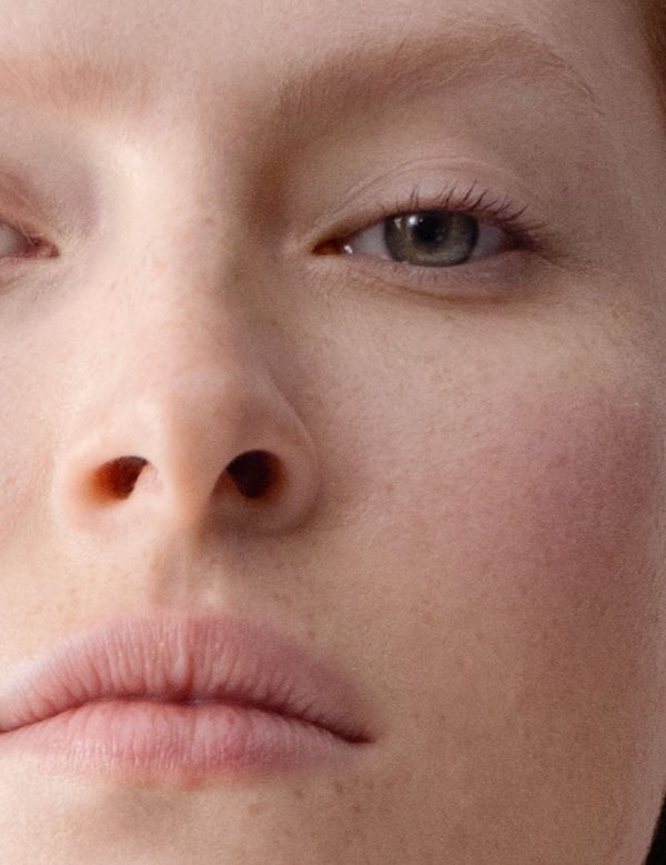 Close-up model wearing Dr Hauschka Concealer