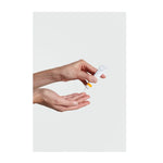 Hands holding Dr. Hauschka Daily Hydrating Eye Cream