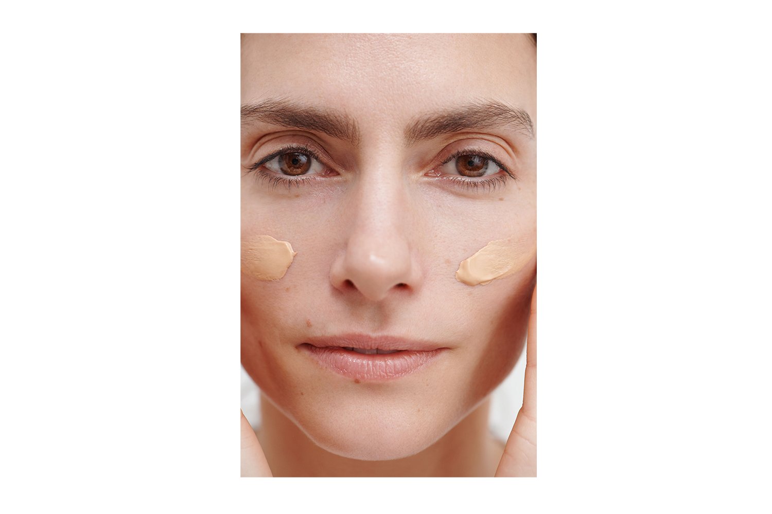 Model applying Dr. Hauschka Regenerating Day Cream Complexion