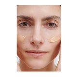 Model applying Dr. Hauschka Regenerating Day Cream Complexion