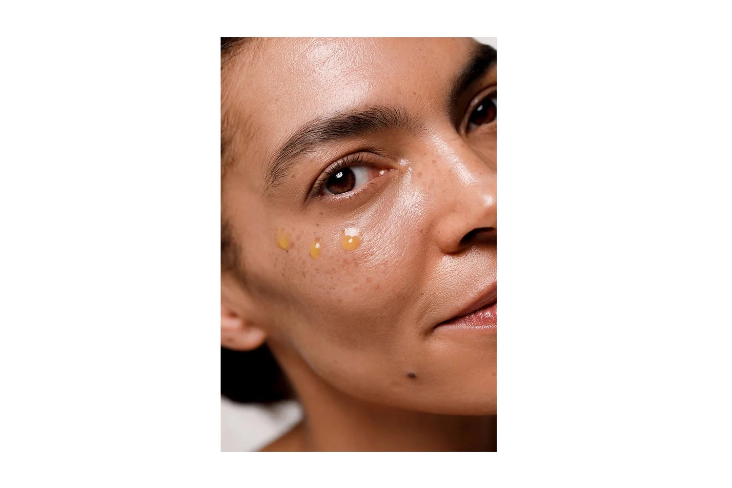 Model wearing Dr. Hauschka Regenerating Eye Serum Intensive
