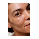 Model wearing Dr. Hauschka Regenerating Eye Serum Intensive