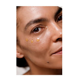 Model wearing Dr. Hauschka Regenerating Eye Serum Intensive