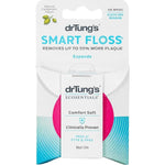 Dr Tung's Smart Floss in white and turquoise card packaging with a pink circle behind the white dispenser, labelled Comfort Soft and natural cardamom flavour.