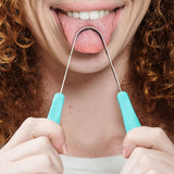 Person using Dr Tung's Stainless Steel Tongue Cleaner