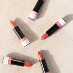 Eco Minerals lipsticks arranged on a stone surface